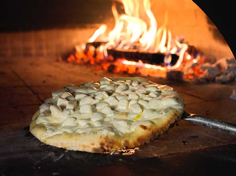 Wite Pizza Being Cooked